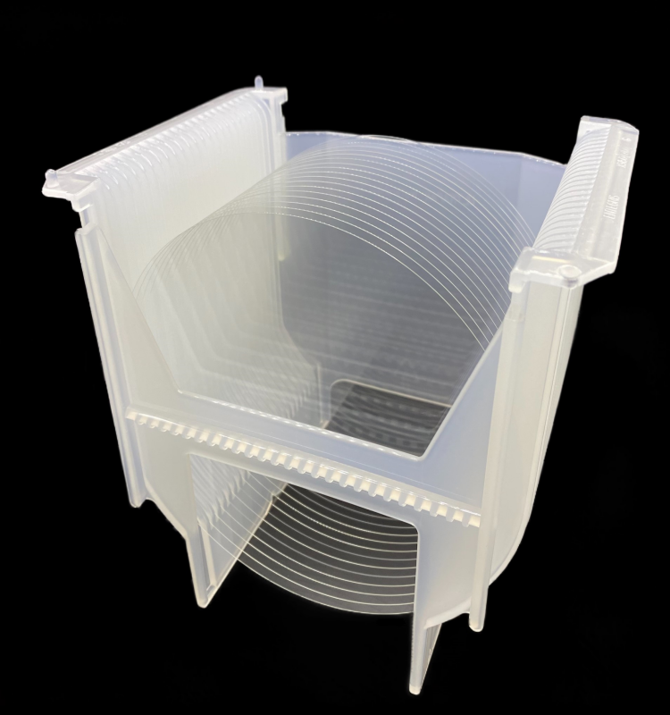 Thin glass wafer substrates stacked in a cleanroom wafer carrier